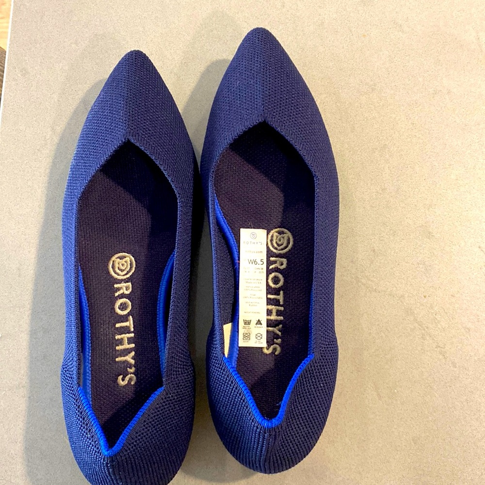 Rothy’s blue flats in excellent condition. Worn only once.